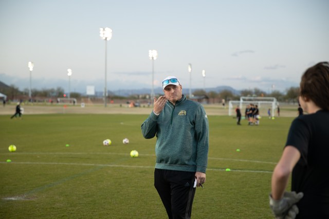 coach at college soccer showcase